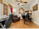 Bright office space featuring hardwood floors, a ceiling fan, and a classic piano at 4010 Tamarack Nw Dr, Kennesaw, GA 30152