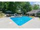 Beautiful pool with a spacious patio, perfect for outdoor entertainment and relaxation at 4010 Tamarack Nw Dr, Kennesaw, GA 30152
