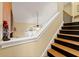 Beautiful staircase with wooden steps and a white banister leading to the upper level at 4010 Tamarack Nw Dr, Kennesaw, GA 30152