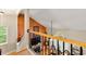 Upper level landing showing staircase, hardwood floors, and an arched window view at 4010 Tamarack Nw Dr, Kennesaw, GA 30152