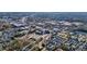 An aerial view of a residential area featuring cozy homes surrounded by lush trees in a desirable neighborhood at 720 Tannery Cmn, Alpharetta, GA 30009