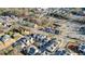 Bird's-eye view of well-maintained townhouses surrounded by mature trees and beautifully landscaped streets in a charming community at 720 Tannery Cmn, Alpharetta, GA 30009