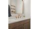 Modern bathroom featuring stylish vanity, quartz countertop and contemporary fixtures at 720 Tannery Cmn, Alpharetta, GA 30009