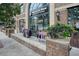 Storefront view with large windows, brick facade, and retail display, creating an appealing shopping experience at 720 Tannery Cmn, Alpharetta, GA 30009