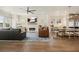 Spacious living room featuring hardwood floors, modern lighting, and an open layout at 720 Tannery Cmn, Alpharetta, GA 30009