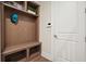 Practical mudroom with custom built-ins, providing ample storage and organization near the entrance at 720 Tannery Cmn, Alpharetta, GA 30009