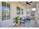 Charming porch with comfortable seating, perfect for relaxing outdoors with a lovely view at 720 Tannery Cmn, Alpharetta, GA 30009