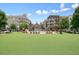 A lively town square with a beautiful fountain, lawn, and comfortable seating, creating a welcoming community gathering spot at 720 Tannery Cmn, Alpharetta, GA 30009
