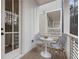 Cozy balcony area with two chairs and a table, perfect for relaxing outdoors at 120 Pinecone Pkwy, Alpharetta, GA 30022