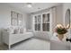 Inviting bedroom with natural light, plush daybed, and decorative accents at 120 Pinecone Pkwy, Alpharetta, GA 30022