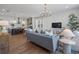 Open floor plan with a gourmet kitchen, dining, and living area with a large kitchen island at 120 Pinecone Pkwy, Alpharetta, GA 30022