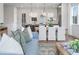 Bright and open kitchen, dining, and living area with hardwood floors at 120 Pinecone Pkwy, Alpharetta, GA 30022