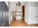Inviting entryway with hardwood floors and a view into the spacious living area at 2006 Hawthorne Way, Woodstock, GA 30189