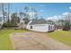 Garage and driveway on a large lot with a basketball hoop at 2006 Hawthorne Way, Woodstock, GA 30189