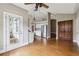 Modern kitchen with stainless steel appliances, white cabinets, and a large window at 2006 Hawthorne Way, Woodstock, GA 30189
