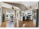 Kitchen area featuring stainless appliances, a breakfast nook and hardwood floors at 2006 Hawthorne Way, Woodstock, GA 30189