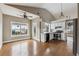 Bright and spacious kitchen with white cabinets, stainless steel appliances, and wood floors at 2006 Hawthorne Way, Woodstock, GA 30189