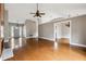 Spacious living room featuring hardwood floors and a fireplace, and multiple entry points at 2006 Hawthorne Way, Woodstock, GA 30189