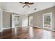 Large bedroom with hardwood floors and natural light at 2006 Hawthorne Way, Woodstock, GA 30189