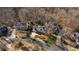 Aerial view of a neighborhood showcasing well-manicured lawns and mature trees at 275 Sageglen Road Rd, Lawrenceville, GA 30044