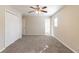 Spacious bedroom featuring neutral carpet and a large closet for ample storage space at 3585 Ale Cir, Atlanta, GA 30344