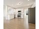 Beautiful kitchen with stainless steel appliances, white cabinets, and hardwood floors at 4074 Gold Mill Rdg, Canton, GA 30114