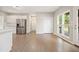 Open-concept kitchen with stainless steel appliances and a view to the deck at 4074 Gold Mill Rdg, Canton, GA 30114