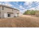 Back exterior view highlighting the outdoor space at 1732 Broad River Rd, Atlanta, GA 30349