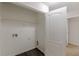 Spacious closet offers shelving and modern flooring at 1732 Broad River Rd, Atlanta, GA 30349
