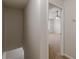 Hallway showcasing access to a room with a ceiling fan at 1732 Broad River Rd, Atlanta, GA 30349