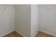 Walk-in closet, complete with carpeting, and wire shelving providing ample storage space in this home at 1732 Broad River Rd, Atlanta, GA 30349