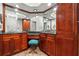 Spacious bathroom with dual vanities, granite countertops, and custom wood cabinets at 3777 Peachtree Ne Rd # 911, Atlanta, GA 30319