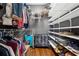 Organized walk-in closet with custom shelving and ample storage space at 3777 Peachtree Ne Rd # 911, Atlanta, GA 30319