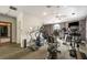 Well-equipped gym featuring treadmills, elliptical machines, and a ceiling fan for a comfortable workout environment at 3777 Peachtree Ne Rd # 911, Atlanta, GA 30319
