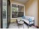 Relaxing patio with a comfortable couch, outdoor seating, and a view of the surrounding greenery at 3777 Peachtree Ne Rd # 911, Atlanta, GA 30319