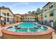 Community pool with fountains, lounge chairs, and well-maintained landscaping for a resort-like experience at 3777 Peachtree Ne Rd # 911, Atlanta, GA 30319