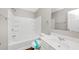 A bathroom with a tub, shower, vanity and mirror at 745 Crestwell Sw Cir, Atlanta, GA 30331