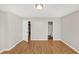 A bedroom with wood floors and neutral paint at 745 Crestwell Sw Cir, Atlanta, GA 30331