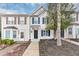 Charming townhouse with a well-maintained lawn and classic architectural details at 745 Crestwell Sw Cir, Atlanta, GA 30331