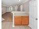 Open-concept floor plan connects the kitchen counter with bar seating to the spacious living room at 745 Crestwell Sw Cir, Atlanta, GA 30331