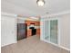 Eat-in kitchen features stainless steel appliances and access to outdoor space via sliding glass door at 745 Crestwell Sw Cir, Atlanta, GA 30331