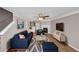 Nicely staged living room with modern furniture, decor, and a cozy fireplace at 745 Crestwell Sw Cir, Atlanta, GA 30331