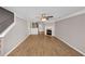 Spacious living room with hardwood floors, fireplace, and neutral color palette at 745 Crestwell Sw Cir, Atlanta, GA 30331