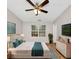A bright bedroom with a fan, window, and furniture at 745 Crestwell Sw Cir, Atlanta, GA 30331