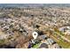 Aerial view of the home situated within a residential area, showcasing its lot and surrounding houses at 2952 Perimeter Cir, Buford, GA 30519