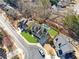 Inviting home boasts lush lawn, pristine pool, and charming architecture in a desirable neighborhood setting at 2952 Perimeter Cir, Buford, GA 30519