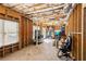 Unfinished basement with visible framework, a window, and access to the outside, waiting to be personalized at 2952 Perimeter Cir, Buford, GA 30519