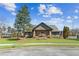 Community clubhouse with a stone facade and well-manicured landscaping provides a welcoming atmosphere at 2952 Perimeter Cir, Buford, GA 30519