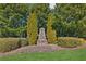 An entrance monument and landscaping enhance the community's curb appeal and identity at 2952 Perimeter Cir, Buford, GA 30519