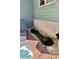 A backyard pond sits along the side of the home, with rocks around the perimeter and an elevated walkway at 2952 Perimeter Cir, Buford, GA 30519